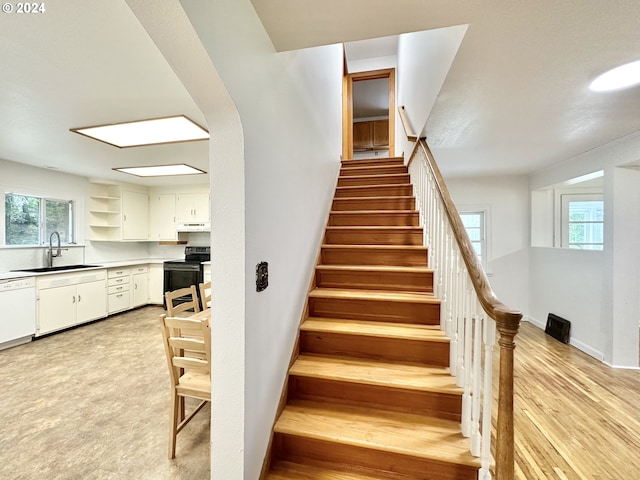 staircase with sink