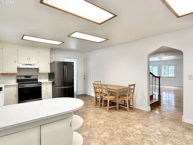 kitchen featuring white cabinets and stainless steel appliances