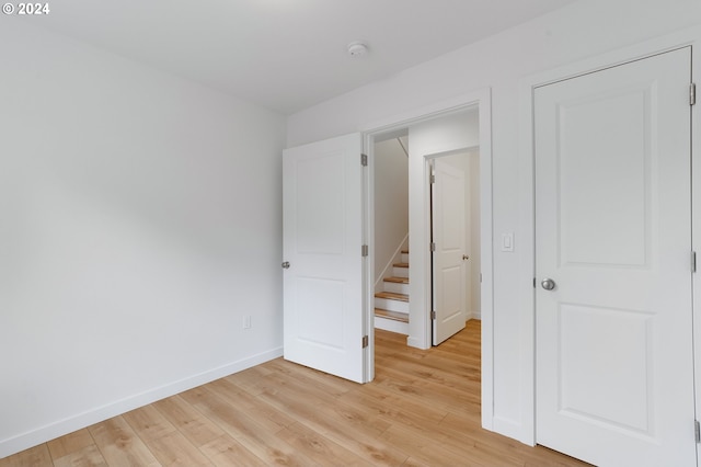 unfurnished bedroom featuring light hardwood / wood-style flooring