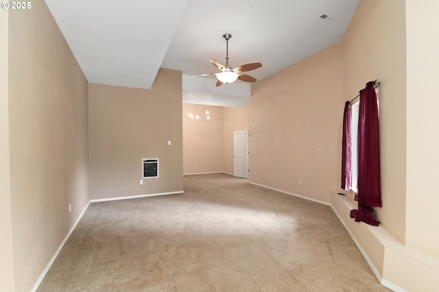 17413 Wake Robin Cir, Oregon City, OR 97045 - unfurnished living room with ceiling fan, light colored carpet, a chandelier, and baseboards