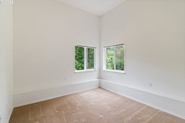 17413 Wake Robin Cir, Oregon City, OR 97045 - carpeted empty room with baseboards and high vaulted ceiling