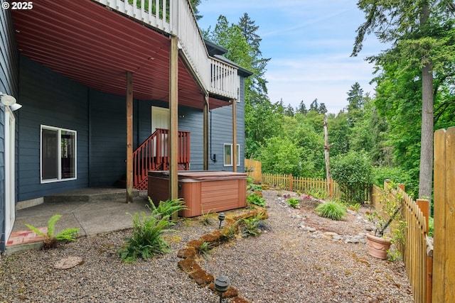 17413 Wake Robin Cir, Oregon City, OR 97045 - fenced backyard with a hot tub and a patio area