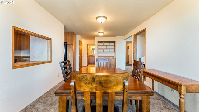 view of carpeted dining room