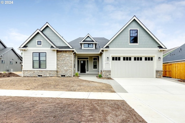 craftsman house with a garage