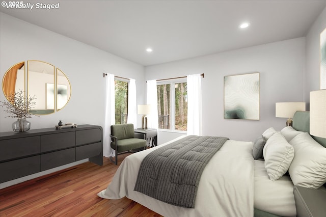 bedroom featuring hardwood / wood-style flooring