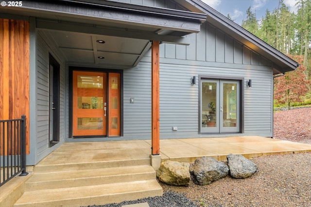 entrance to property with a patio and french doors