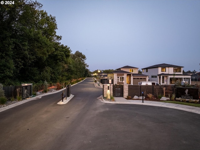 view of road with curbs and sidewalks