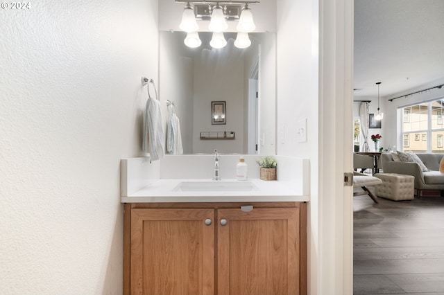 bathroom featuring vanity and hardwood / wood-style flooring