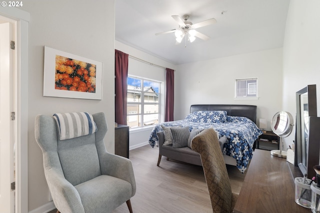 bedroom featuring ceiling fan and wood-type flooring