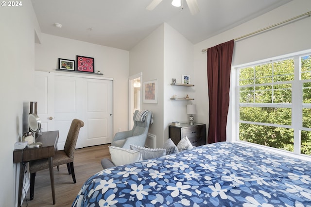 bedroom with hardwood / wood-style flooring and ceiling fan