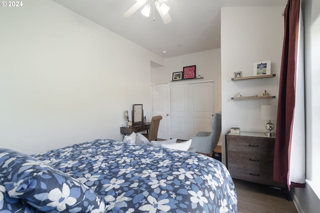 bedroom featuring dark wood-type flooring and ceiling fan