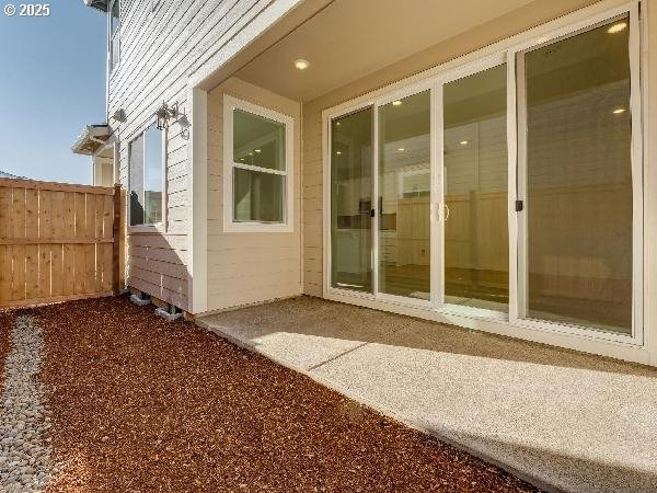 property entrance with fence