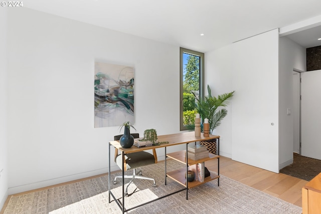 home office featuring hardwood / wood-style flooring