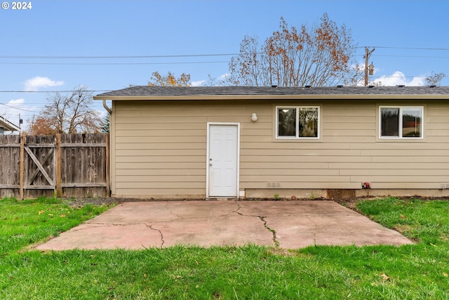 view of outbuilding with a lawn