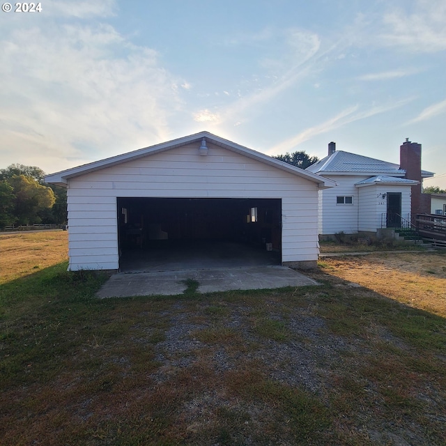 garage with a lawn