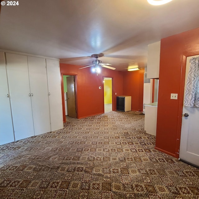 interior space featuring ceiling fan