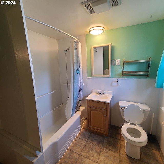 full bathroom with tile patterned floors, shower / bath combination with curtain, toilet, and vanity