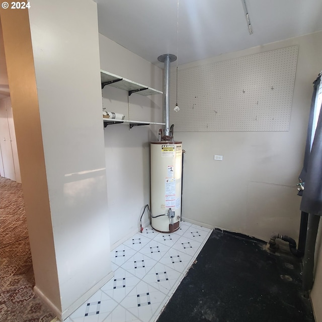 utility room featuring gas water heater