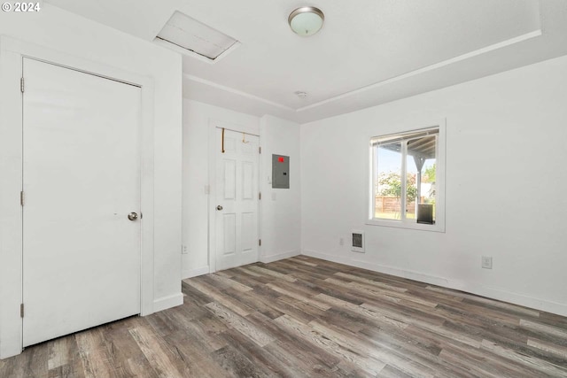 empty room with wood-type flooring