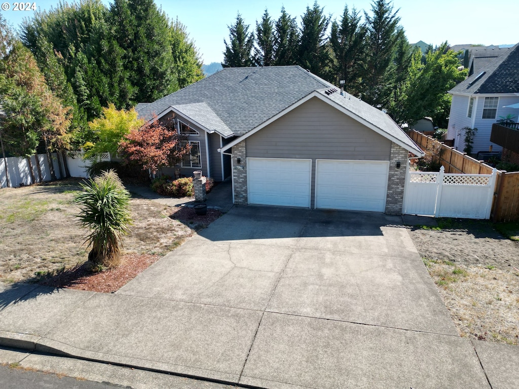 view of front of property featuring a garage