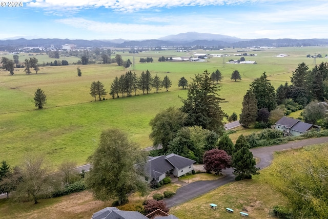 bird's eye view with a mountain view and a rural view