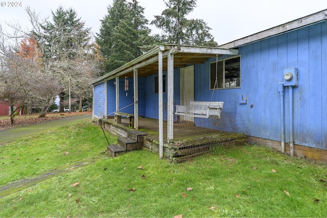 view of home's exterior featuring a lawn