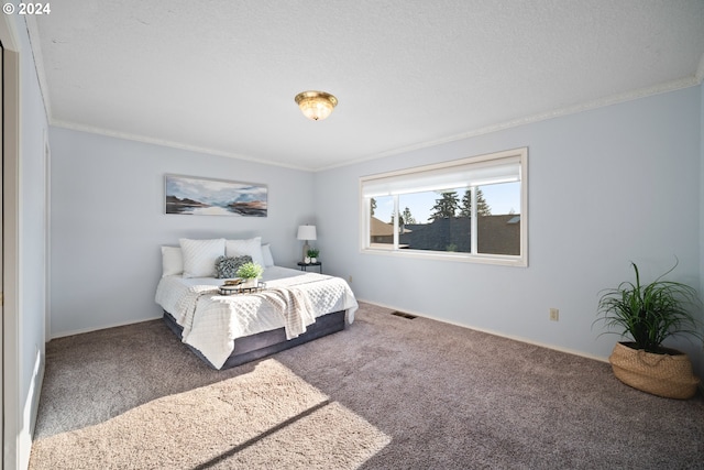 carpeted bedroom with crown molding