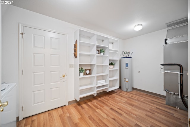 1205 NW 132nd St Unit B, Vancouver, WA 98685 - unfurnished office featuring water heater, washer and clothes dryer, and light wood finished floors