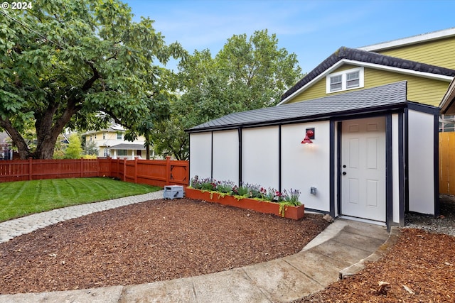 view of outdoor structure with a yard