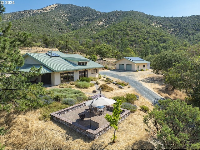 drone / aerial view featuring a mountain view