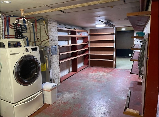 interior space with washer / clothes dryer and water heater