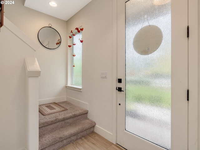 doorway to outside featuring light wood-type flooring