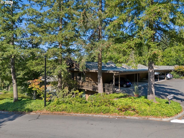 view of front of property with a carport