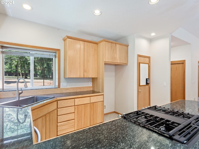 27580 SW Canyon Creek Rd, Wilsonville, OR 97070 - kitchen with light brown cabinetry, a sink, cooktop, recessed lighting, and baseboards