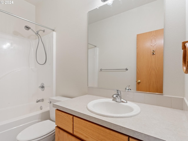 full bathroom featuring vanity, toilet, and bathing tub / shower combination