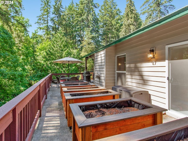 wooden deck with area for grilling