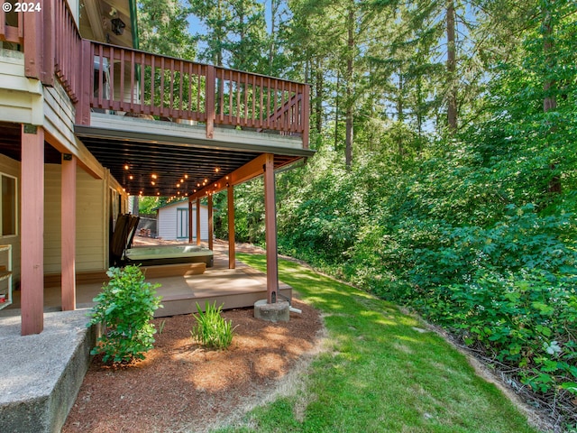 view of yard with a deck