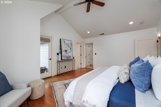 bedroom with wood-type flooring, vaulted ceiling, and ceiling fan