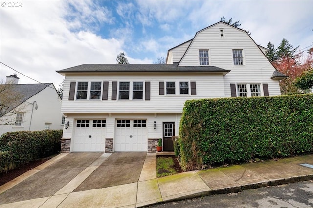 view of front of property featuring a garage