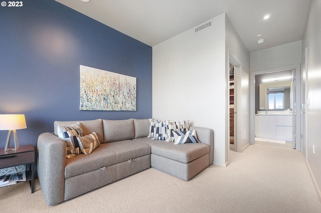 1150 NW Quimby St Unit 436, Portland, OR 97209 - living area with carpet flooring, baseboards, and recessed lighting