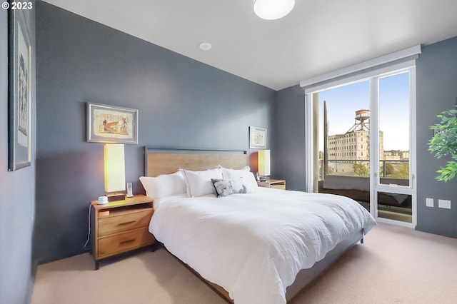 1150 NW Quimby St Unit 436, Portland, OR 97209 - carpeted bedroom with access to outside