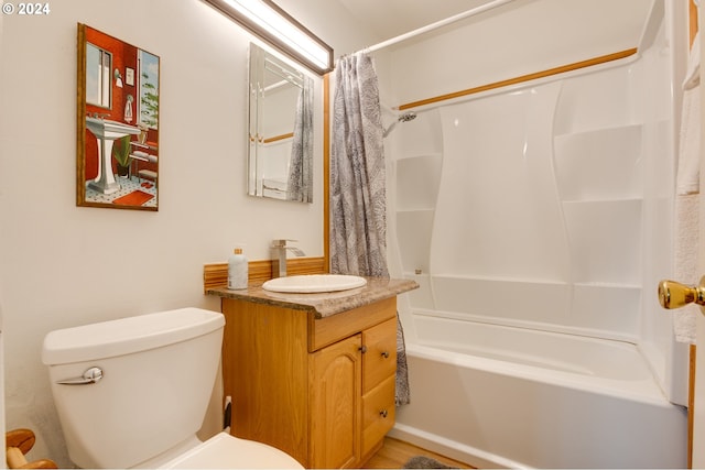 full bathroom with shower / bath combination with curtain, vanity, and toilet