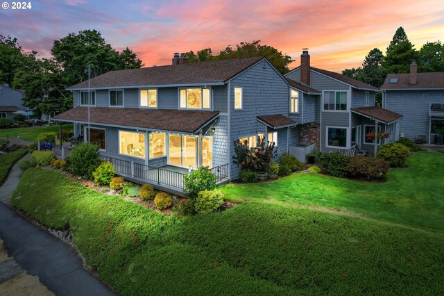 view of front of home featuring a yard