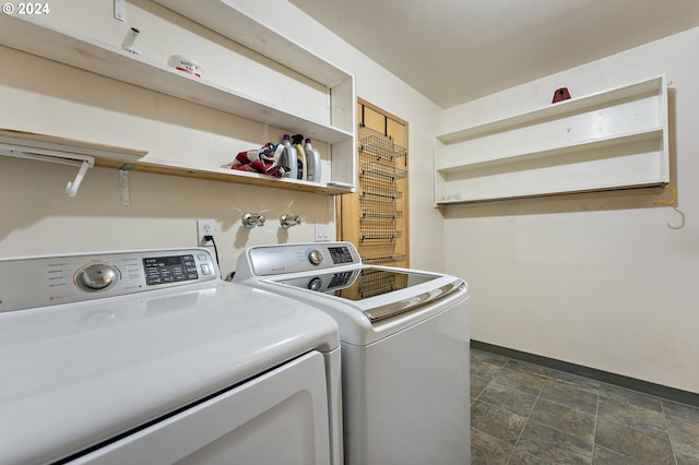 washroom featuring washer and dryer