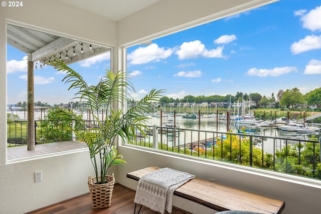 balcony featuring a water view