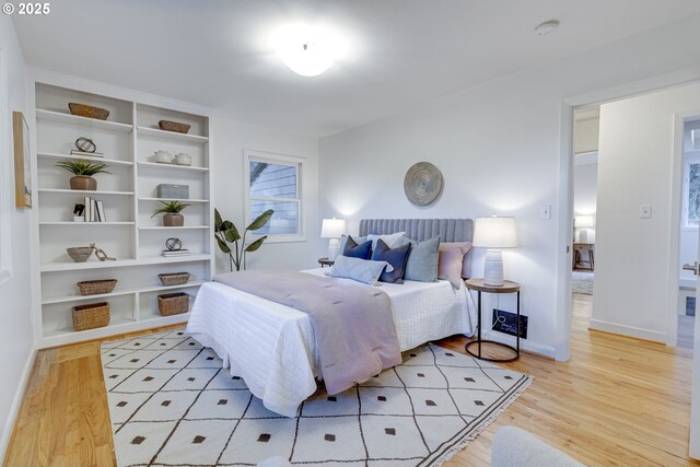 bedroom with light hardwood / wood-style floors