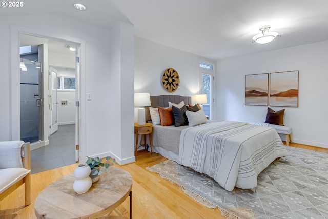 bedroom with hardwood / wood-style flooring