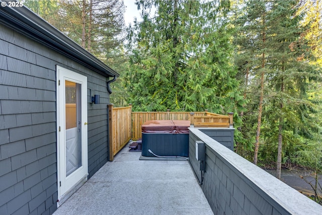 view of patio with a hot tub