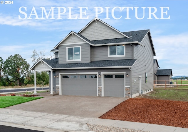 craftsman-style home featuring a garage