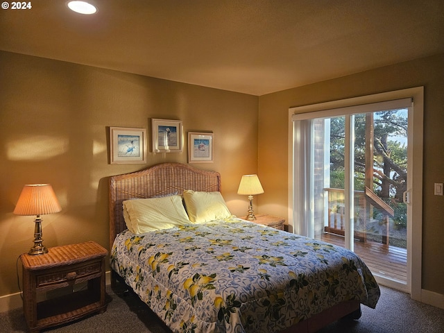 carpeted bedroom with baseboards and access to outside